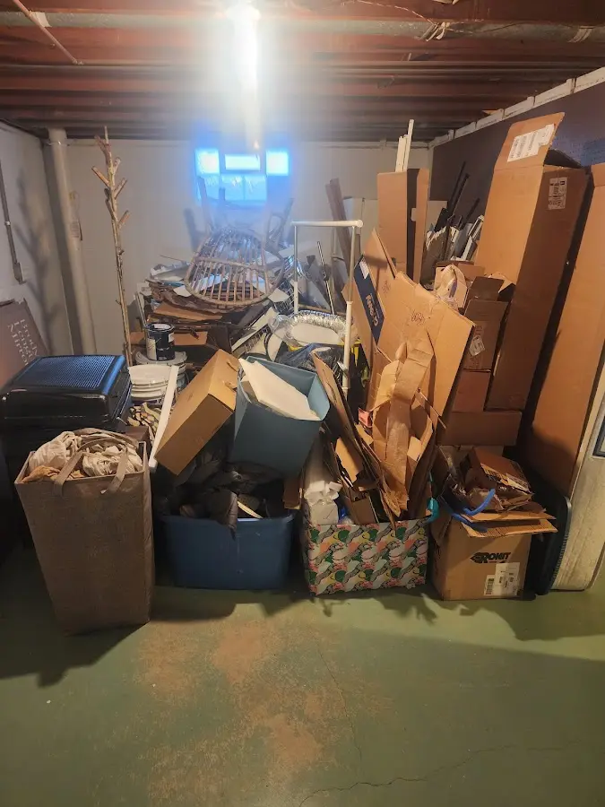 Roll-off dumpster container at job site for 2 Yard Dumpster Rental in Constantia